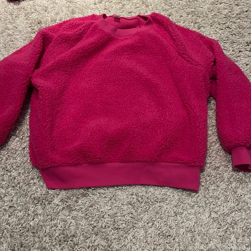 Bright pink fuzzy crewneck